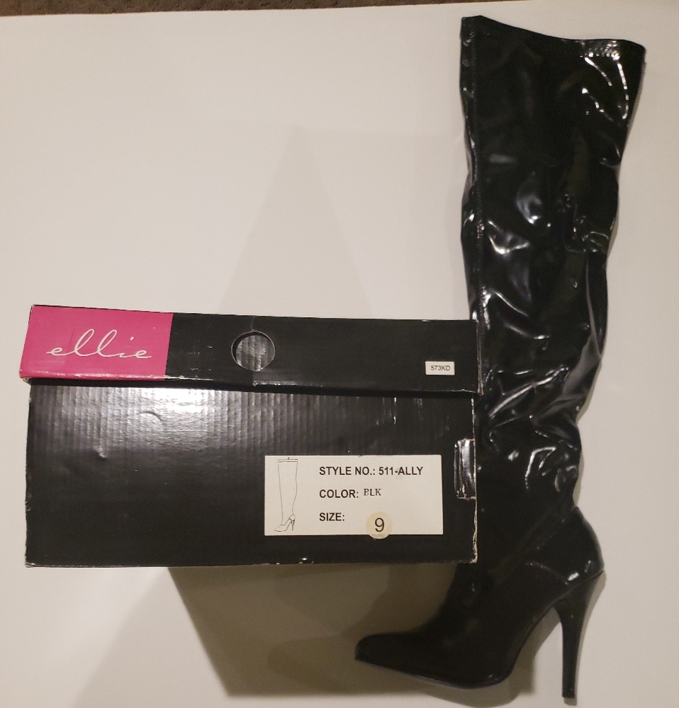 Black stretch knee high boots by ellie